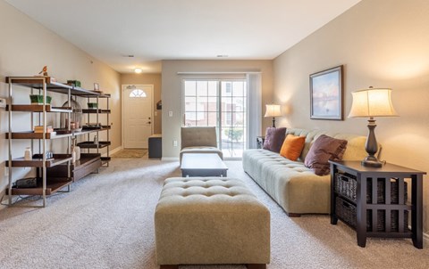 a living room with a couch and a table